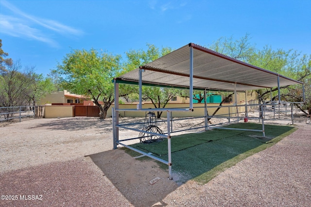 view of property's community featuring an outdoor structure and an exterior structure