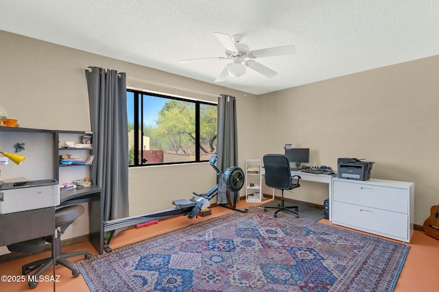 office area featuring a textured ceiling and a ceiling fan