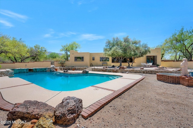 outdoor pool with a patio