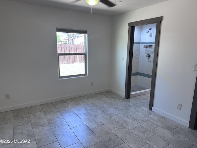 419 N Miller Ln, Saint David, AZ 85630 - unfurnished room featuring tile patterned flooring, baseboards, and ceiling fan