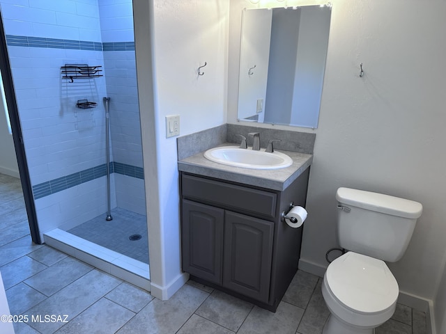 419 N Miller Ln, Saint David, AZ 85630 - bathroom with tile patterned floors, a tile shower, toilet, baseboards, and vanity