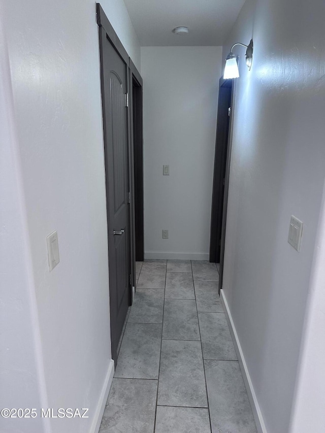 419 N Miller Ln, Saint David, AZ 85630 - hall with baseboards and light tile patterned floors