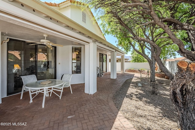view of patio / terrace featuring a fenced backyard and ceiling fan