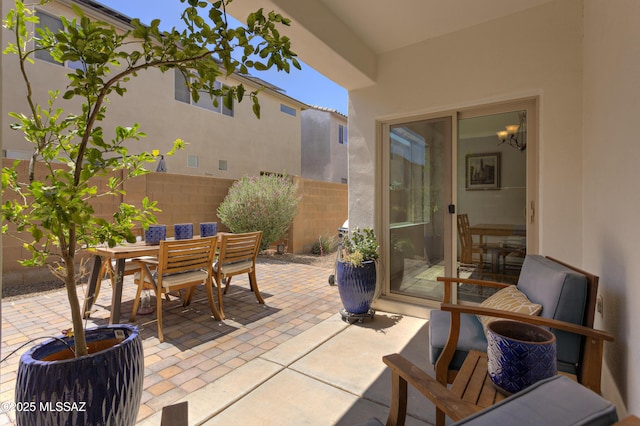view of patio / terrace with fence and outdoor dining area
