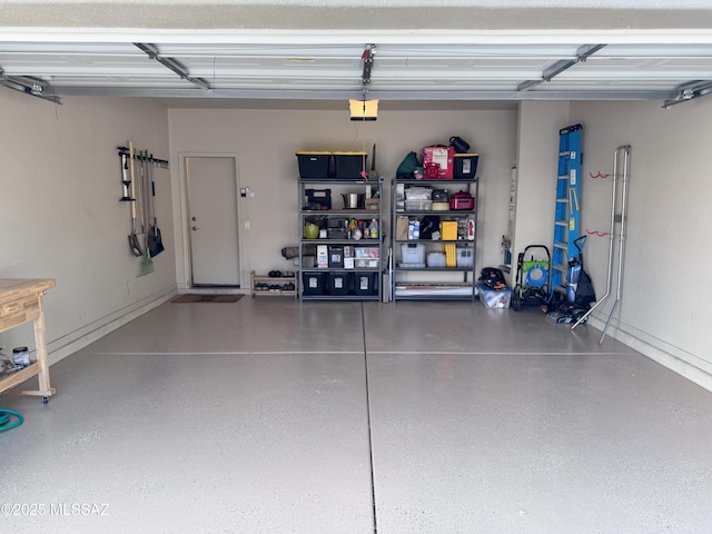 garage featuring a garage door opener