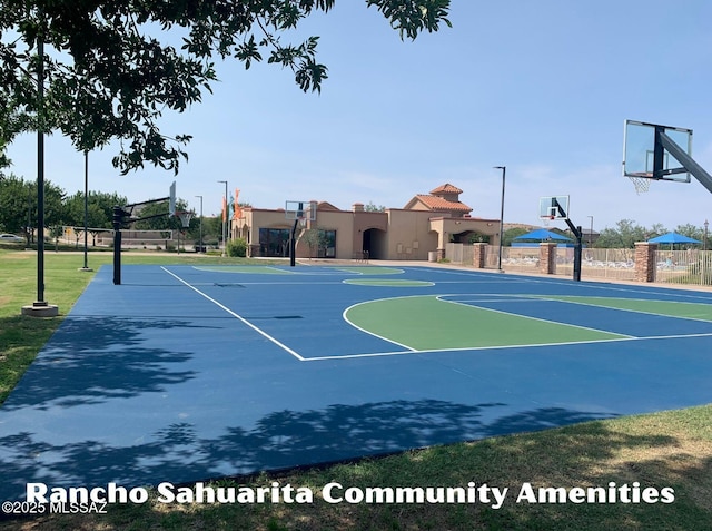 view of sport court featuring fence and community basketball court