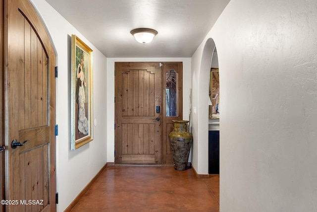 901 W Las Lomitas Rd, Tucson, AZ 85704 - foyer with arched walkways and finished concrete floors