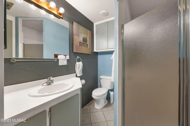 901 W Las Lomitas Rd, Tucson, AZ 85704 - full bathroom featuring tile patterned flooring, vanity, and a shower with shower door