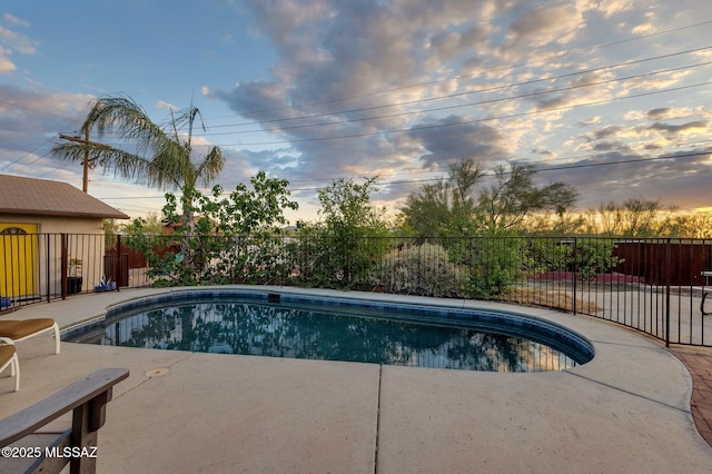 901 W Las Lomitas Rd, Tucson, AZ 85704 - pool at dusk with a fenced backyard and a patio area