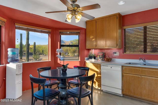 901 W Las Lomitas Rd, Tucson, AZ 85704 - kitchen with white dishwasher, light countertops, light tile patterned floors, ceiling fan, and recessed lighting