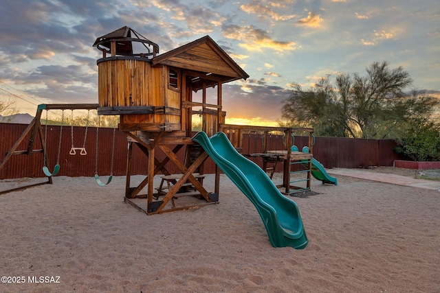 901 W Las Lomitas Rd, Tucson, AZ 85704 - playground at dusk featuring a playground