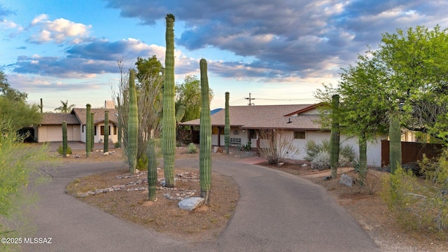901 W Las Lomitas Rd, Tucson, AZ 85704 - view of front of house featuring curved driveway and a shingled roof