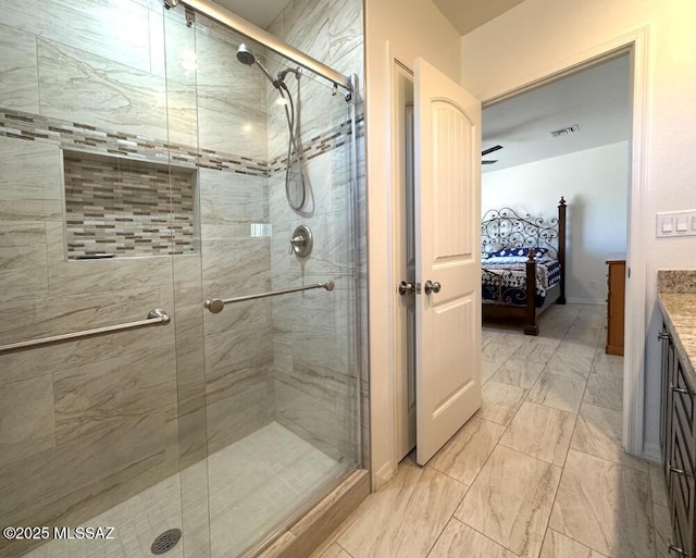 full bath featuring a shower stall, ensuite bathroom, vanity, marble finish floor, and visible vents