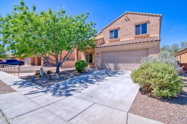 mediterranean / spanish-style home with stucco siding, a tile roof, driveway, and a garage