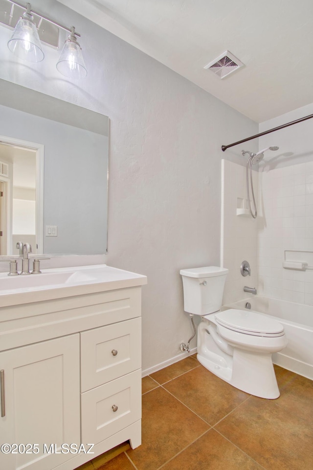 7889 N Chainfruit Cholla Dr, Tucson, AZ 85741 - full bathroom with toilet, tile patterned flooring, vanity, and  shower combination