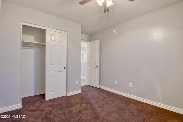 unfurnished bedroom with visible vents, baseboards, a ceiling fan, a closet, and carpet floors