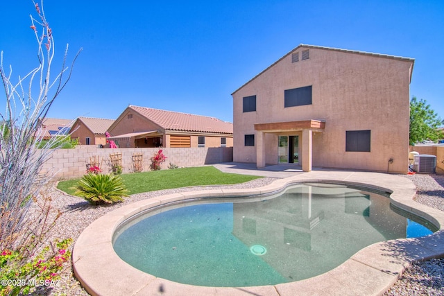 7889 N Chainfruit Cholla Dr, Tucson, AZ 85741 - view of pool with a fenced backyard, cooling unit, and a patio