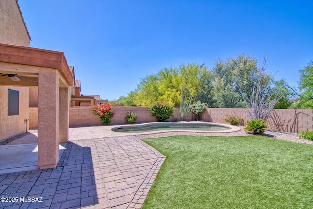 7889 N Chainfruit Cholla Dr, Tucson, AZ 85741 - view of yard featuring a patio area