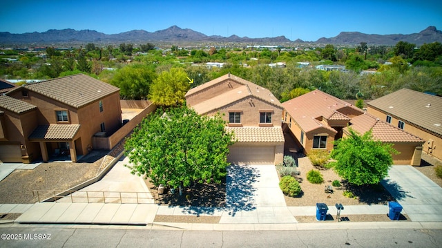 aerial view featuring a residential view and a mountain view