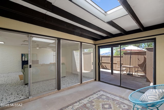 5701 E Glenn St Unit 57, Tucson, AZ 85712 - interior space with beamed ceiling and a skylight