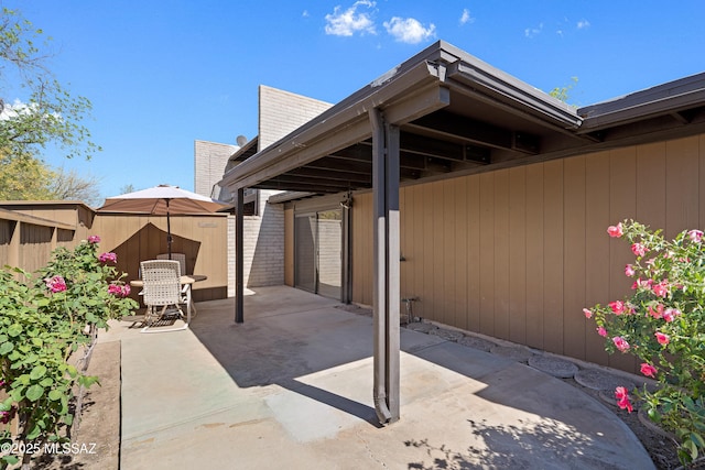 5701 E Glenn St Unit 57, Tucson, AZ 85712 - view of patio featuring fence