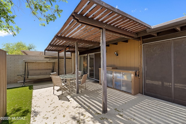 5701 E Glenn St Unit 61, Tucson, AZ 85712 - view of patio featuring fence and outdoor dining space