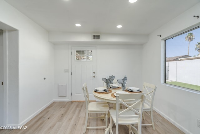 6624 N Galaxy Rd, Tucson, AZ 85741 - dining space with baseboards, light wood-style floors, visible vents, and recessed lighting