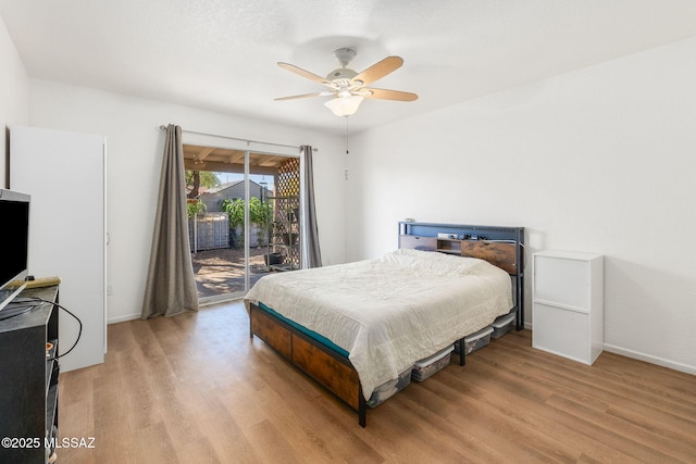 bedroom with a ceiling fan, baseboards, access to outside, and light wood-style floors