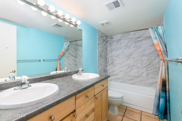 full bath featuring shower / bath combination with curtain, a sink, and visible vents