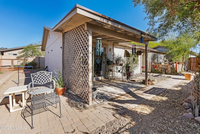 view of patio featuring fence
