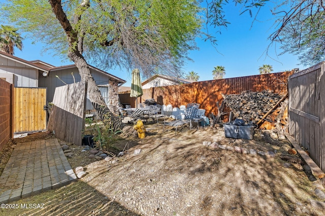 view of yard featuring a fenced backyard