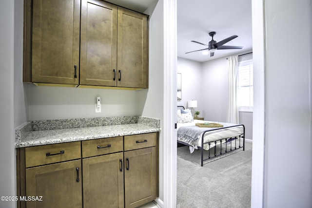 5854 W Indian Sunrise Dr, Tucson, AZ 85742 - bedroom featuring baseboards and light colored carpet