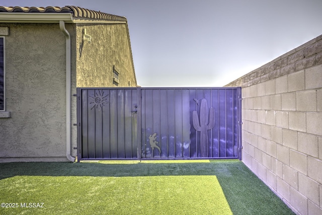 5854 W Indian Sunrise Dr, Tucson, AZ 85742 - view of yard with a gate