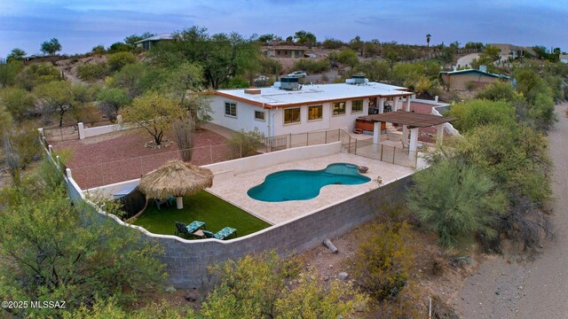 5122 W Camino De La Amapola, Tucson, AZ 85745 - back of property featuring a fenced backyard and a patio area
