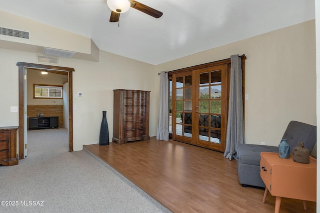 5122 W Camino De La Amapola, Tucson, AZ 85745 - living area with ceiling fan, wood finished floors, and french doors
