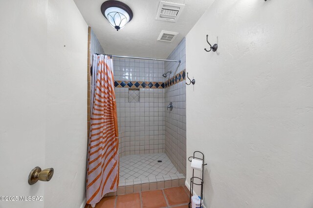 5122 W Camino De La Amapola, Tucson, AZ 85745 - bathroom with tiled shower and tile patterned flooring