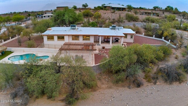 5122 W Camino De La Amapola, Tucson, AZ 85745 - rear view of house with a fenced backyard and a patio area
