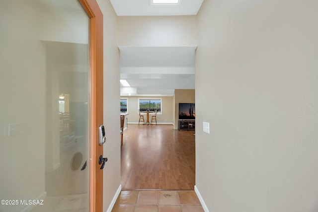 5122 W Camino De La Amapola, Tucson, AZ 85745 - hallway featuring baseboards and light tile patterned floors