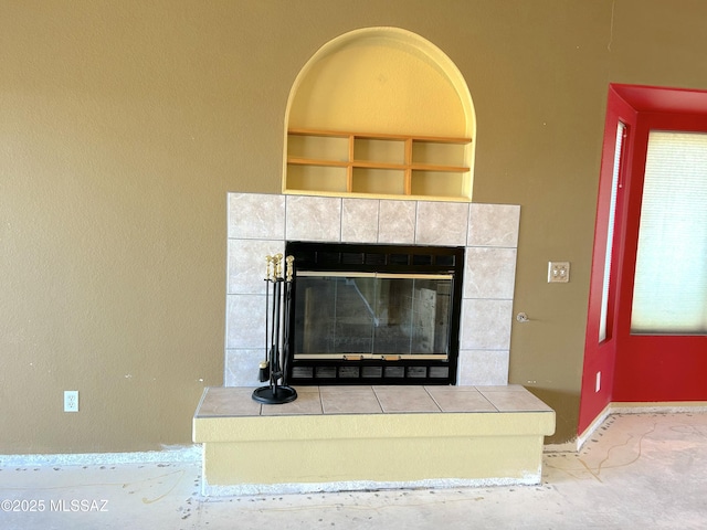 10211 E Hummingbird Meadow Way, Tucson, AZ 85747 - interior details with baseboards and a fireplace
