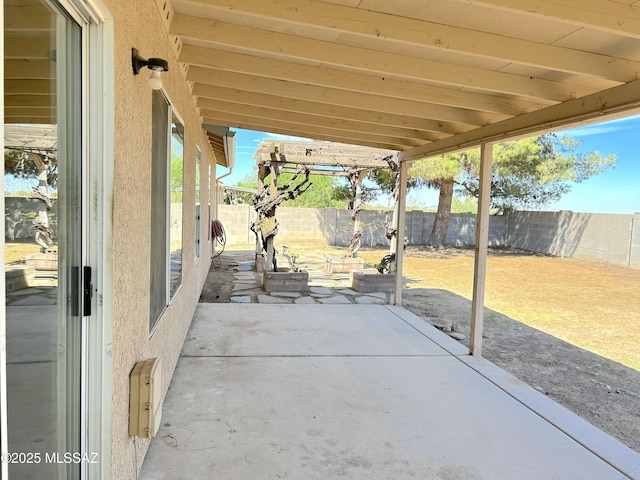 10211 E Hummingbird Meadow Way, Tucson, AZ 85747 - view of patio / terrace with a fenced backyard