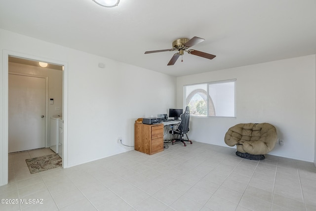 office area featuring light tile patterned flooring and ceiling fan