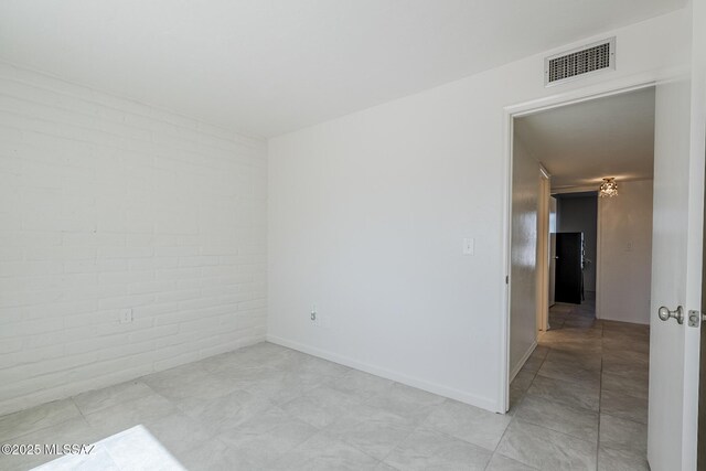 empty room featuring visible vents