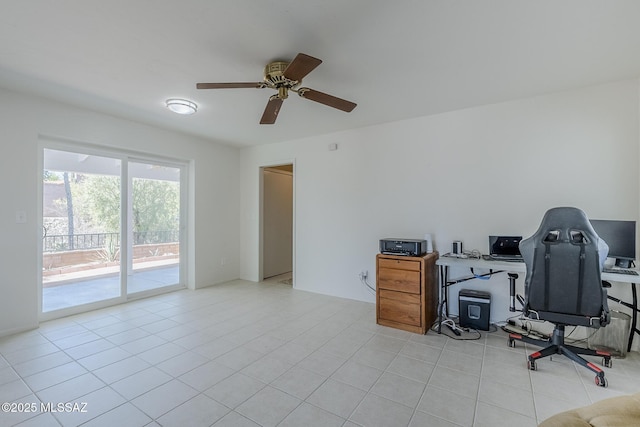 home office with tile patterned floors and ceiling fan