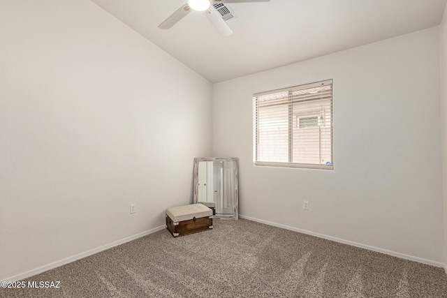 unfurnished room featuring visible vents, carpet floors, a ceiling fan, baseboards, and vaulted ceiling
