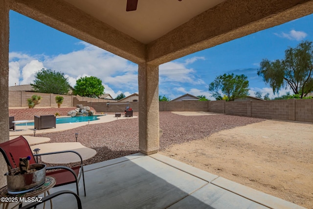 view of patio / terrace featuring a fenced in pool and a fenced backyard