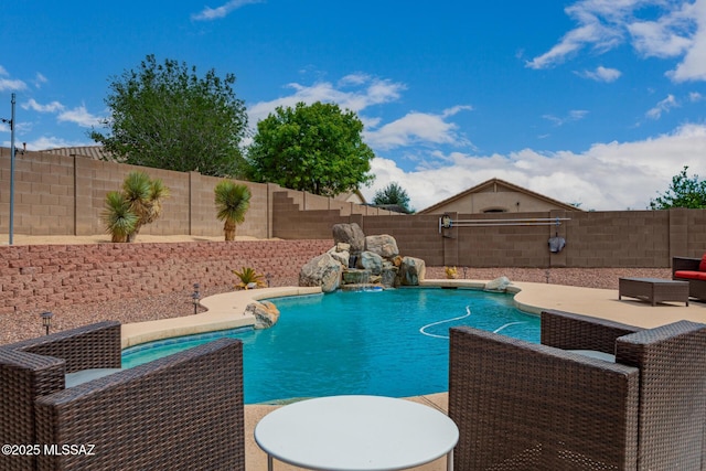 view of pool with a fenced in pool and a fenced backyard