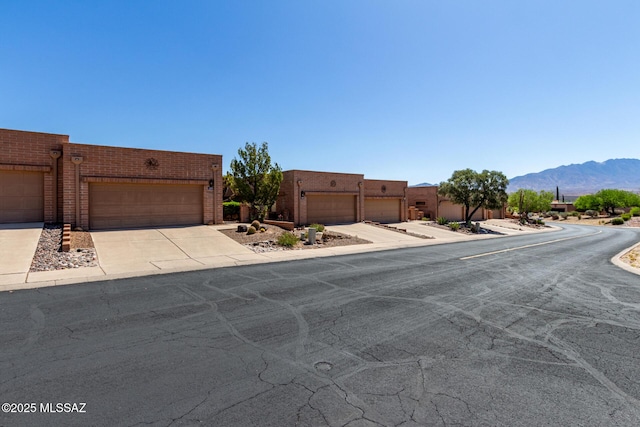 exterior space featuring a mountain view