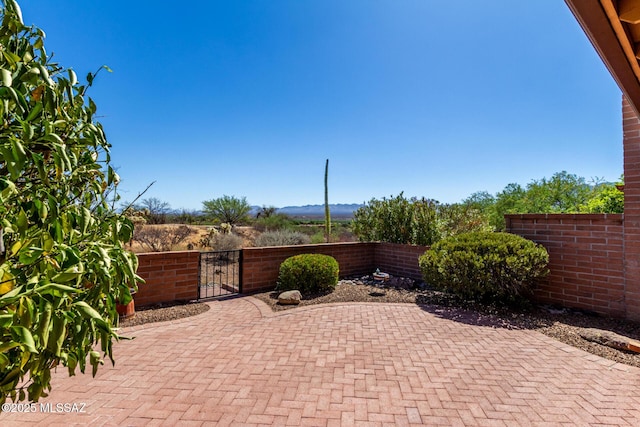 view of patio with fence