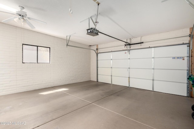 garage with a garage door opener and a ceiling fan