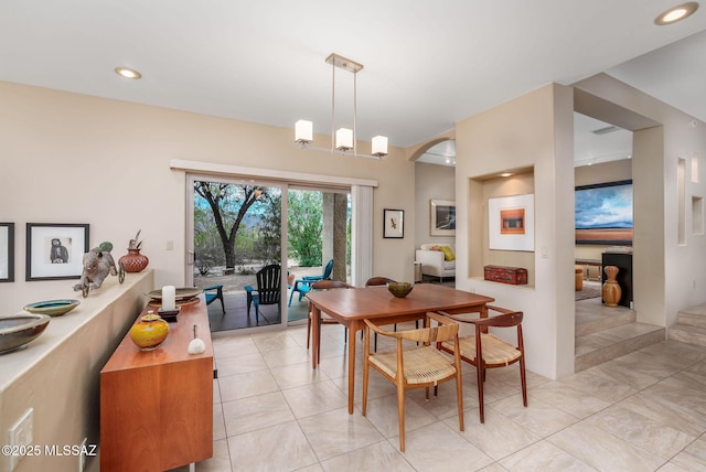 dining space with recessed lighting